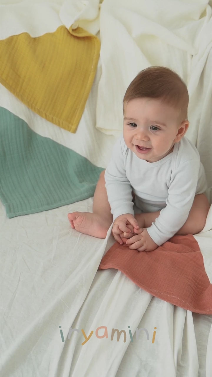 Load video: Joy of Colors Organic Cotton 4 Layer Muslin Blanket Mustard 100x100